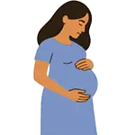 Woman in a cute blue dress, smiling and holding her belly.